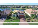 Charming single-Gathering home with a well-manicured lawn, beautiful landscaping, and a brick driveway at 17026 Loudon Pl, Bradenton, FL 34202