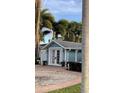 Charming additional building with double French doors and brick pathway at 3504 Estrada St, Sarasota, FL 34239