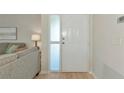 Light and bright entryway with a frosted glass window accents the main door to the living space at 617 Estuary Dr # 617, Bradenton, FL 34209