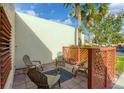 Enclosed patio features seating, a garden and privacy lattice at 801 Spring Lakes Blvd # 801, Bradenton, FL 34210