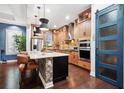 A modern kitchen featuring a large island, stainless steel appliances, and ample cabinet space at 10406 Eastwood Dr, Bradenton, FL 34211