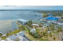 Stunning waterfront property with boat access, showcasing the home's prime location and nearby marina at 4011 11Th Street W Ct, Palmetto, FL 34221