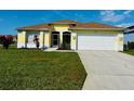 Inviting single-Gathering home with a two-car garage and green lawn at 4515 50Th W Dr, Bradenton, FL 34210