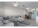 Open-concept living area offers a view of dining space and an adjacent kitchen at 4658 Sabal Key Dr, Bradenton, FL 34203