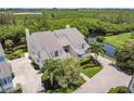 Stunning aerial view of the home's exterior showing the expansive property at 121 Tidy Island Blvd, Bradenton, FL 34210
