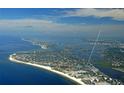Aerial view of a coastal townhome community close to the beach and the Gulf of Mexico at 1249 Dockside Pl # 110, Sarasota, FL 34242