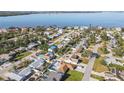 Aerial view of the neighborhood showcasing waterfront property and mature landscaping around the homes at 7807 24Th W Ave, Bradenton, FL 34209