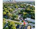 Aerial view showcasing the neighborhood, lush greenery, and the home's location at 919 W Warren Ave, Tampa, FL 33602