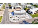 Aerial view of home showcasing the roof, covered parking, and surrounding landscaping at 818 50Th Avenue W Ter, Bradenton, FL 34207