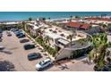 Coastal condo complex near the beach with assigned parking, landscaping, and beach access in a beautiful location at 4621 Gulf Of Mexico Dr # 19B, Longboat Key, FL 34228