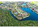Stunning aerial view of a waterfront property with a private dock, lush landscaping and gorgeous waterways at 5007 Palermo Dr, Punta Gorda, FL 33950