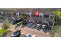Beautiful townhomes with private garages and well-maintained landscaping at 5527 Palmer Cir # 105, Bradenton, FL 34211
