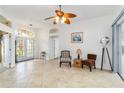 Living room with tile flooring, stylish furniture, and natural light at 10306 Palmbrooke Ter, Bradenton, FL 34202