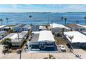 Stunning aerial view of waterfront community showcasing the home's prime location near the water at 10315 Cortez W Rd # 17F, Bradenton, FL 34210