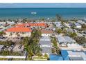 Aerial view of a charming property close to the ocean and local establishments at 520 Spring Ave # A, Anna Maria, FL 34216