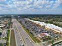 Aerial view of the shopping area near the community, with easy access to the highway at 13 Belcher Ave, North Port, FL 34288