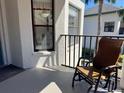 Cozy balcony with a comfortable wicker chair, offering a sunny spot for relaxation at 4440 47Th W Ave # 204, Bradenton, FL 34210