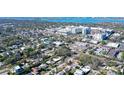 An aerial view showing proximity to the coast, city, and surrounding neighborhood of the property at 2130 Temple St, Sarasota, FL 34239