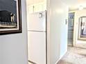 Hallway showing access to the other rooms at 5904 Palm Ln # C23, Bradenton, FL 34207