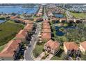 Aerial view of lovely neighborhood offering waterfront living, marina and pond at 1318 3Rd Street E Cir, Palmetto, FL 34221