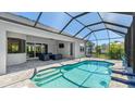 Sparkling pool with a screened lanai and outdoor seating area for relaxation and entertaining at 8144 37Th Avenue W Cir, Bradenton, FL 34209