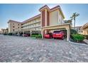 The condo building offers covered parking spaces under the building and paved driveway at 1250 N Portofino Dr # 408Mar, Sarasota, FL 34242