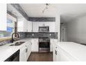 Well-equipped kitchen featuring a full suite of stainless steel appliances and ample counter space at 2406 25Th W Ave, Bradenton, FL 34205