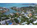 Stunning aerial view showcasing waterfront properties with access to bay and city skyline at 1231 S Orange Ave, Sarasota, FL 34239