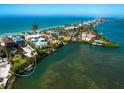 Beautiful waterfront property with a private dock, nestled on a serene coastline at 1304 Casey Key Rd, Nokomis, FL 34275