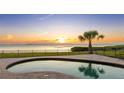 Enjoy amazing water views from the backyard pool area with ample room for entertaining guests at 202 Gaines Ave, Sarasota, FL 34243