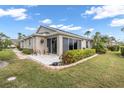 Cozy home with a screened lanai and a well-manicured lawn, perfect for outdoor enjoyment at 2904 Captains Ct # 2904, Palmetto, FL 34221