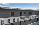 Exterior view of the building showing balconies and architectural details at 3860 Ironwood Ln # 503G, Bradenton, FL 34209