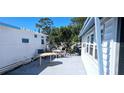 Outdoor patio area ideal for dining and relaxing under blue skies at 10315 Cortez W Rd # 71-4, Bradenton, FL 34210