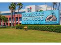 Pinebrook Ironwood Golf Club sign welcomes the public, framed by manicured lawns and palm trees at 3750 Pinebrook Circle # Apt 505, Bradenton, FL 34209