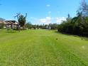 Scenic view of a lush golf course, showcasing the community's amenities at 6042 Red Maple Rd # 1001, Bradenton, FL 34210