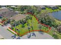 Aerial view of home showing the backyard, lot lines, and mature landscaping at 6857 Wild Lake Ter, Bradenton, FL 34212