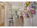 Bright foyer showcasing stylish decor, light-colored flooring, and an open view into the home's living spaces at 4149 Salernes Ave # 3048, Sarasota, FL 34233