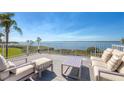 Spacious deck offers comfortable seating and panoramic views of the serene bay at 44 Tidy Island Blvd, Bradenton, FL 34210