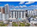 Beautiful high-rise condo building featuring multiple balconies and a rooftop pool at 101 S Gulfstream Ave # 14G, Sarasota, FL 34236