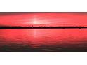 Scenic water view at sunset, showcasing calm waters and skyline at 2212 6Th W St, Palmetto, FL 34221