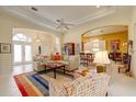 Spacious living room with neutral tones, open layout, and view to other rooms at 7762 Us Open Loop, Lakewood Ranch, FL 34202