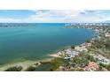Breathtaking aerial view of waterfront homes with bay backdrop at 1622 Wisconsin Ln, Sarasota, FL 34239