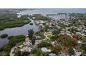 Scenic aerial view of home in a waterfront community surrounded by lush greenery at 2653 44Th S St, Gulfport, FL 33711