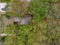 Bird's eye view of home nestled among mature trees, offering privacy and shade at 2653 44Th S St, Gulfport, FL 33711