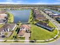 Gorgeous aerial view of waterfront property and lush surroundings at 4790 Pastel Ct, Sarasota, FL 34240