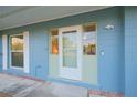 Home entrance features glass door flanked by sidelight windows, providing ample natural light at 4015 11Th W Ave, Bradenton, FL 34205
