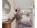 Inviting living area featuring stylish decor, wood floors, and an abundance of natural light at 4240 Ironwood Cir # 302A, Bradenton, FL 34209