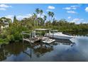 Beautiful waterfront home featuring a private boat dock and lift, ideal for enjoying aquatic adventures at 503 1St Nw Ave, Ruskin, FL 33570