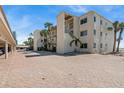 Condo exterior featuring balconies and lots of parking at 4835 Gulf Of Mexico Dr # 302B, Longboat Key, FL 34228