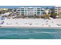 Breathtaking view of the beach from the luxury condominium building, a serene coastal scene at 1035 Seaside Dr # 603, Sarasota, FL 34242